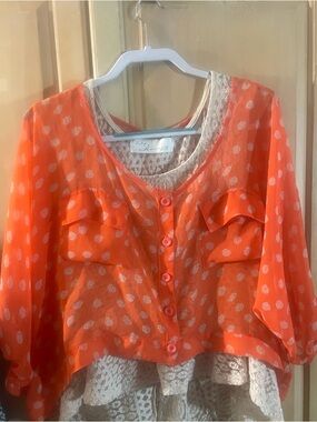Beautiful Free People Sheer Mango Color Blouse.